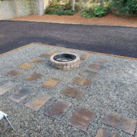 Fire Pit by Infinity Outdoor Services LLC in Des Moines WA. Built from bricks and surrounded by rocks. What a nice area for family fire gatherings! Fire Pit by Infinity Outdoor Services LLC in Des Moines WA. Built from bricks and surrounded by rocks. What a nice area for family fire gatherings!